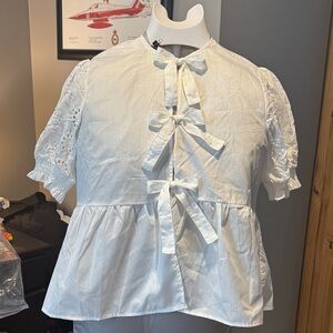 Elegant White Blouse with Lace Details